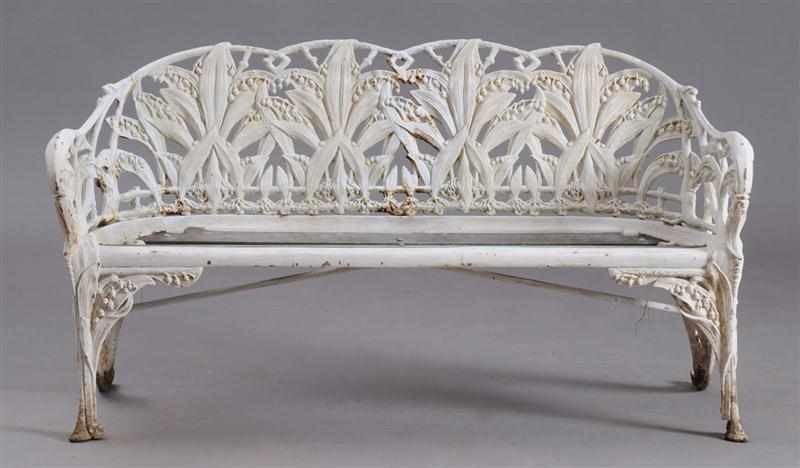 Appraisal: VICTORIAN WHITE-PAINTED CAST-IRON GARDEN BENCH The pierced back cast with