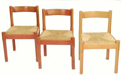 Appraisal: A pair of Magestretti chairs retailed by Habitat stained pine