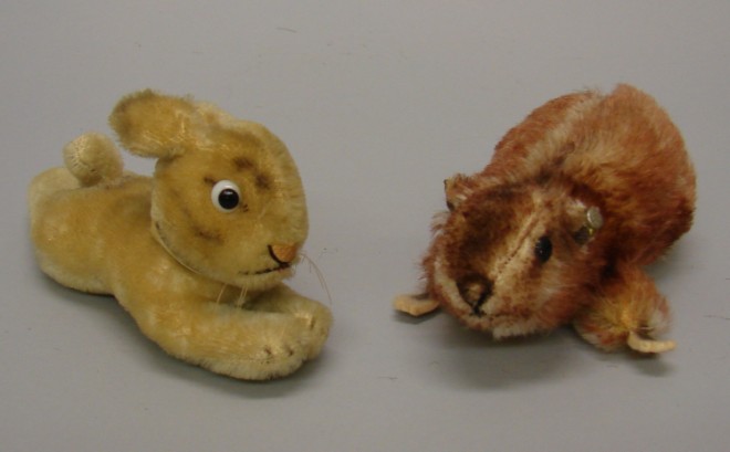 Appraisal: Pair of mohair animals L Beige reclining rabbit with black