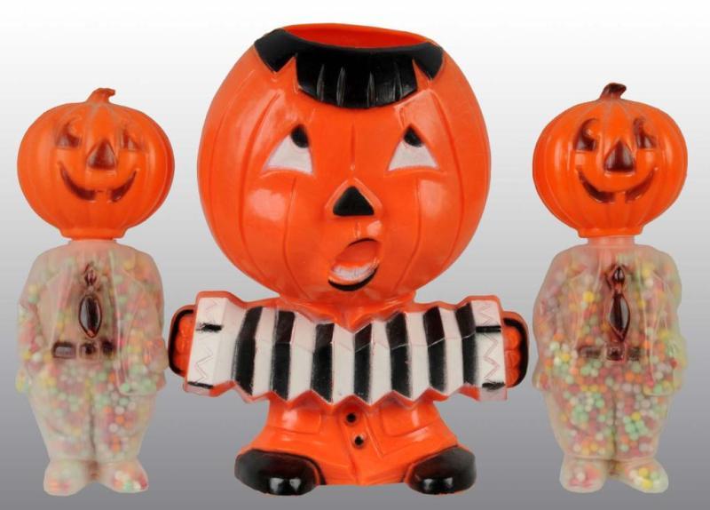 Appraisal: Lot of Plastic Halloween Candy Containers Description Includes two pumpkin