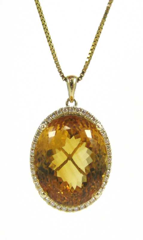 Appraisal: CITRINE AND DIAMOND PENDANT NECKLACE with a - inch k