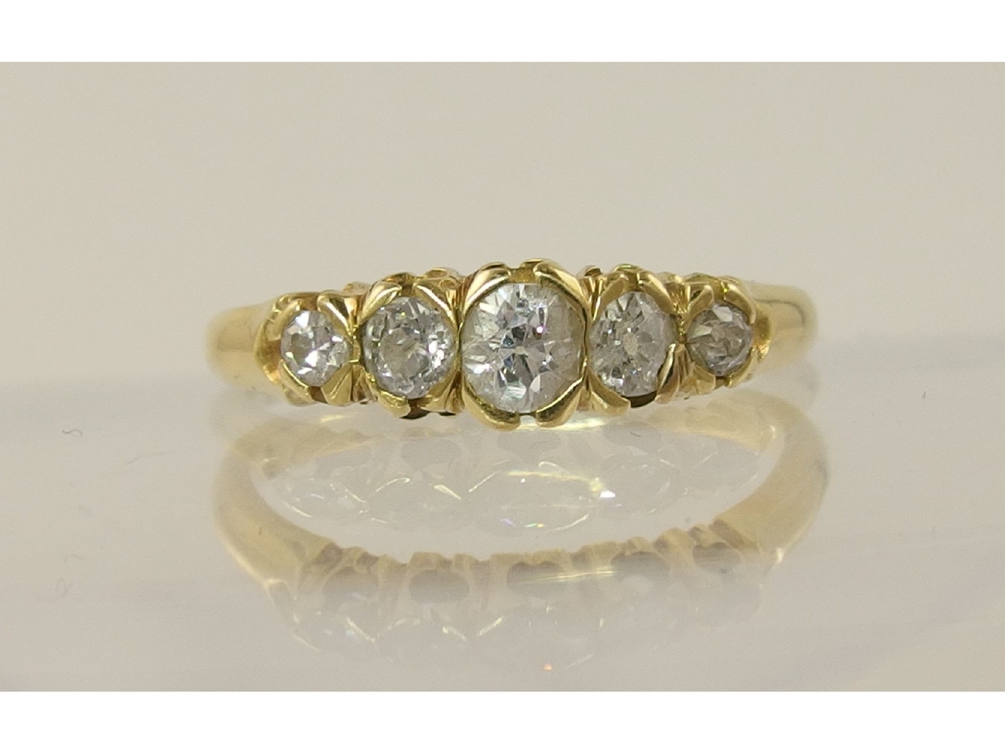 Appraisal: An ct five stone diamond ring of approximately cts combinedunusually