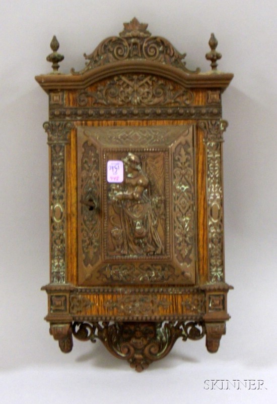 Appraisal: Embossed Copper-mounted Grain-painted Metal Wall Key Cabinet depicting a woman