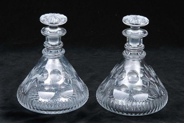 Appraisal: A PAIR OF HEAVY CUT GLASS SHIP DECANTERS with mushroom