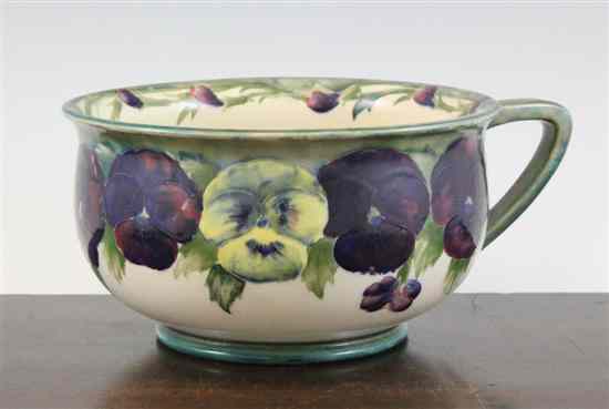 Appraisal: A Moorcroft Pansy pattern chamberpot c with a pale green