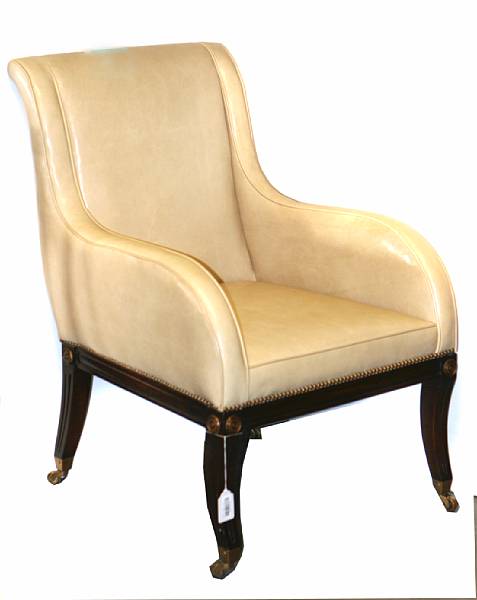 Appraisal: A pair of Regency style leather upholstered armchairs height in