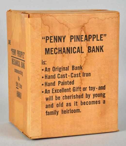 Appraisal: Cast Iron Pineapple Mechanical Bank Circa Sealed in original box