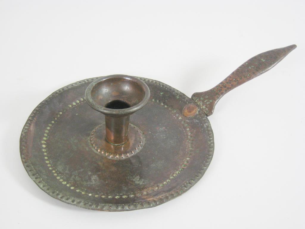 Appraisal: A Newlyn hammered copper Chamber Candlestick with monogram J P