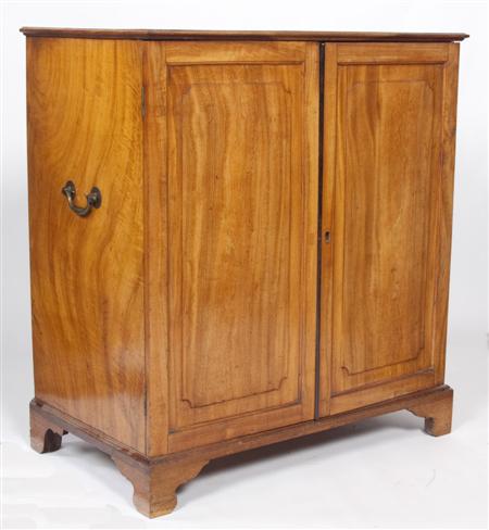 Appraisal: A th century mahogany linen cabinet the moulded rectangular top