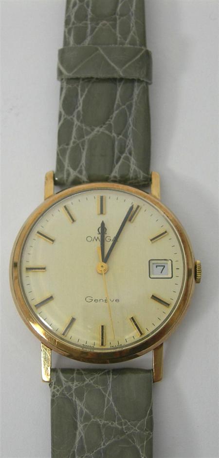 Appraisal: OMEGA - a gentleman's gold Geneve wrist watch the brushed