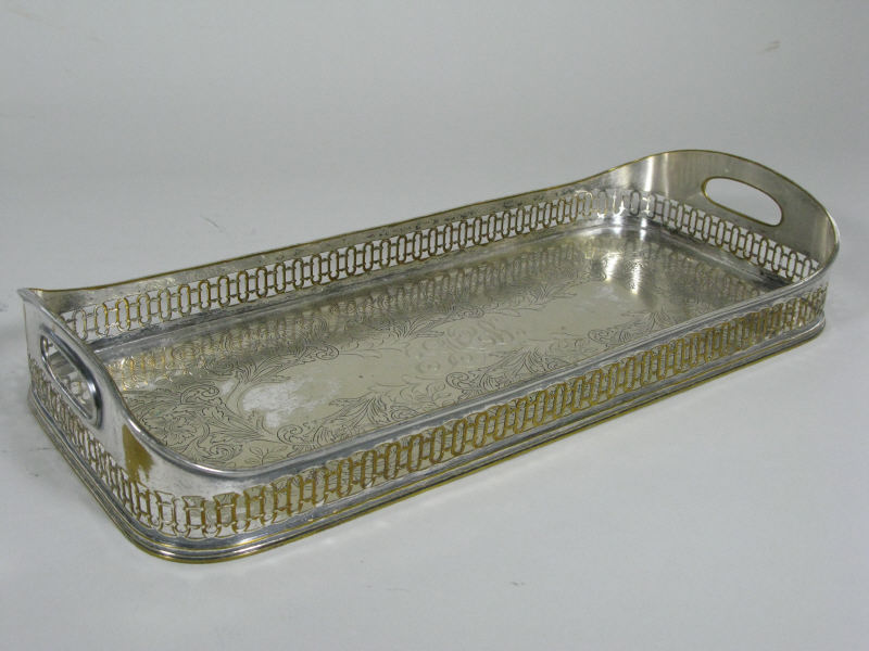 Appraisal: Gallery Silverplate Tray English having pierced gallery with handles all