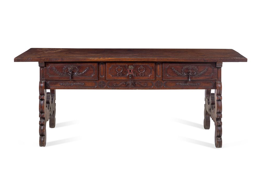 Appraisal: A Continental Carved Walnut Trestle Table A Continental Carved Walnut