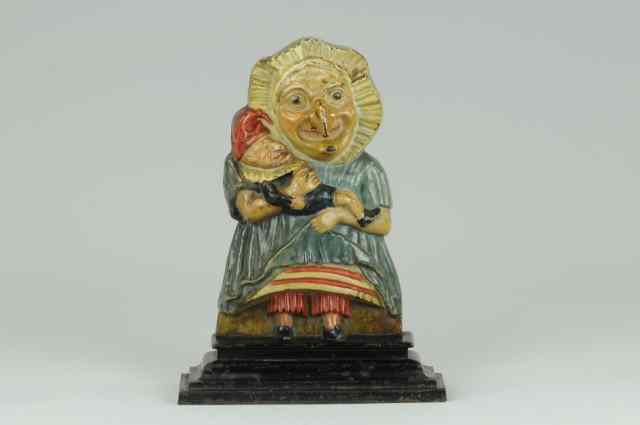 Appraisal: JUDY DOORSTOP English two piece casting shows familiar character Judy