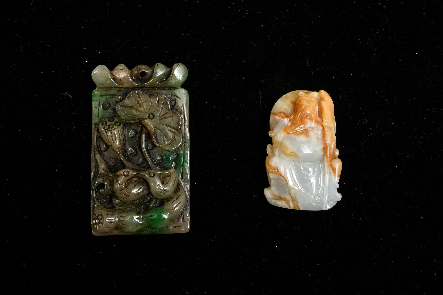 Appraisal: CHINESE CARVED JADE PENDANTS Comprising - Guan Yu pendant -