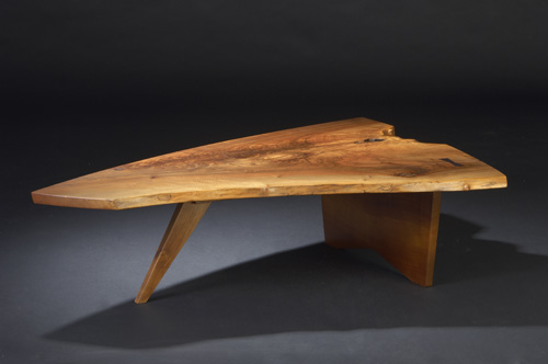 Appraisal: GEORGE NAKASHIMA Walnut Slab coffee table with natural occlusions and