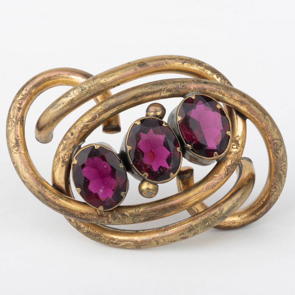 Appraisal: Gold and Garnet Brooch Unmarked x in dwts Condition Overall