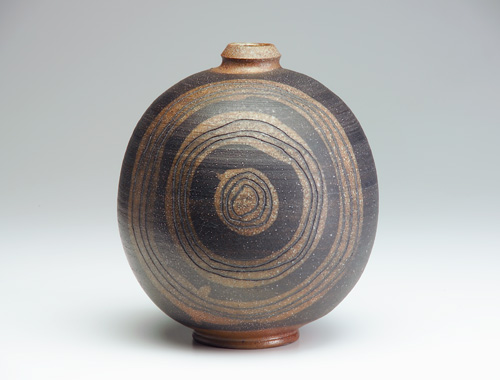 Appraisal: ANTONIO PRIETO Spherical stoneware vase incised and painted with concentric