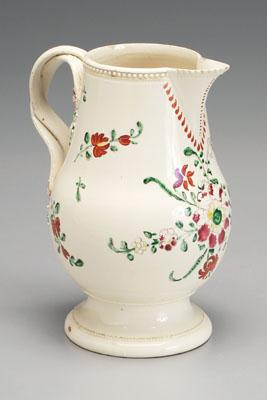 Appraisal: Creamware pitcher double strap handle beaded borders iron red and