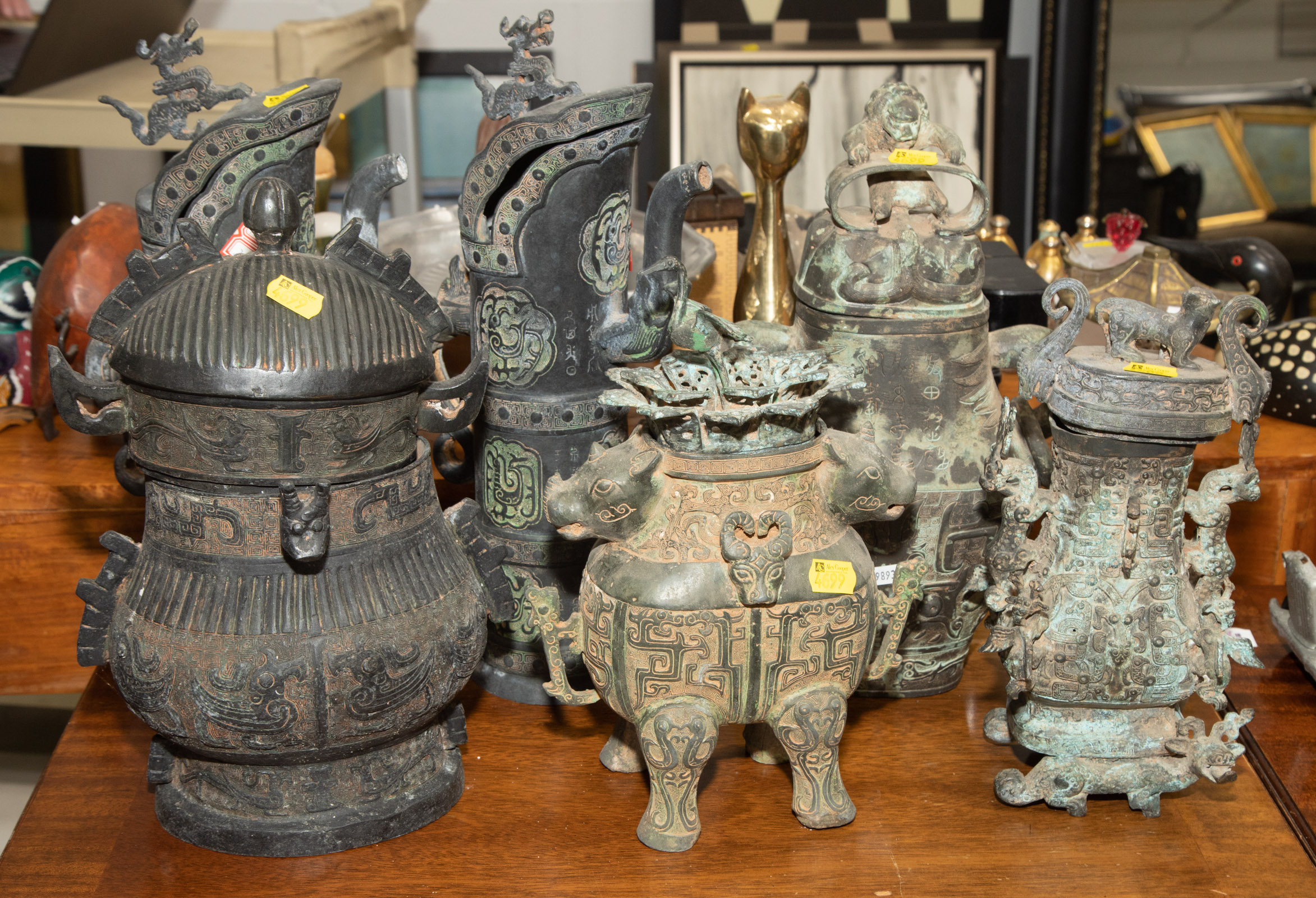 Appraisal: SIX CHINESE ARCHAIC STYLE BRONZE VESSELS th century to in