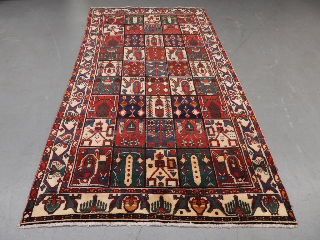 Appraisal: PERSIAN BAKHTIARI CARPET RUG Persia th CenturyRepeating central grid pattern