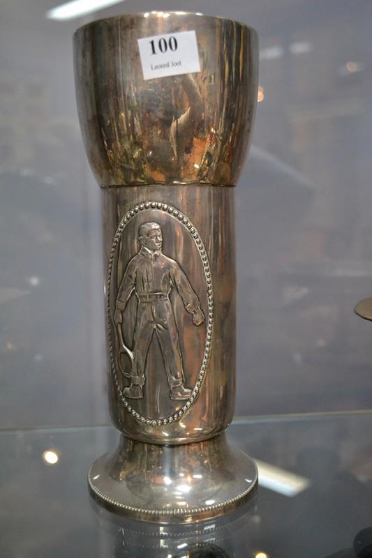 Appraisal: GERMAN SILVER VASE WITH APPLIED TENNIS PLAYER CARTOUCHE