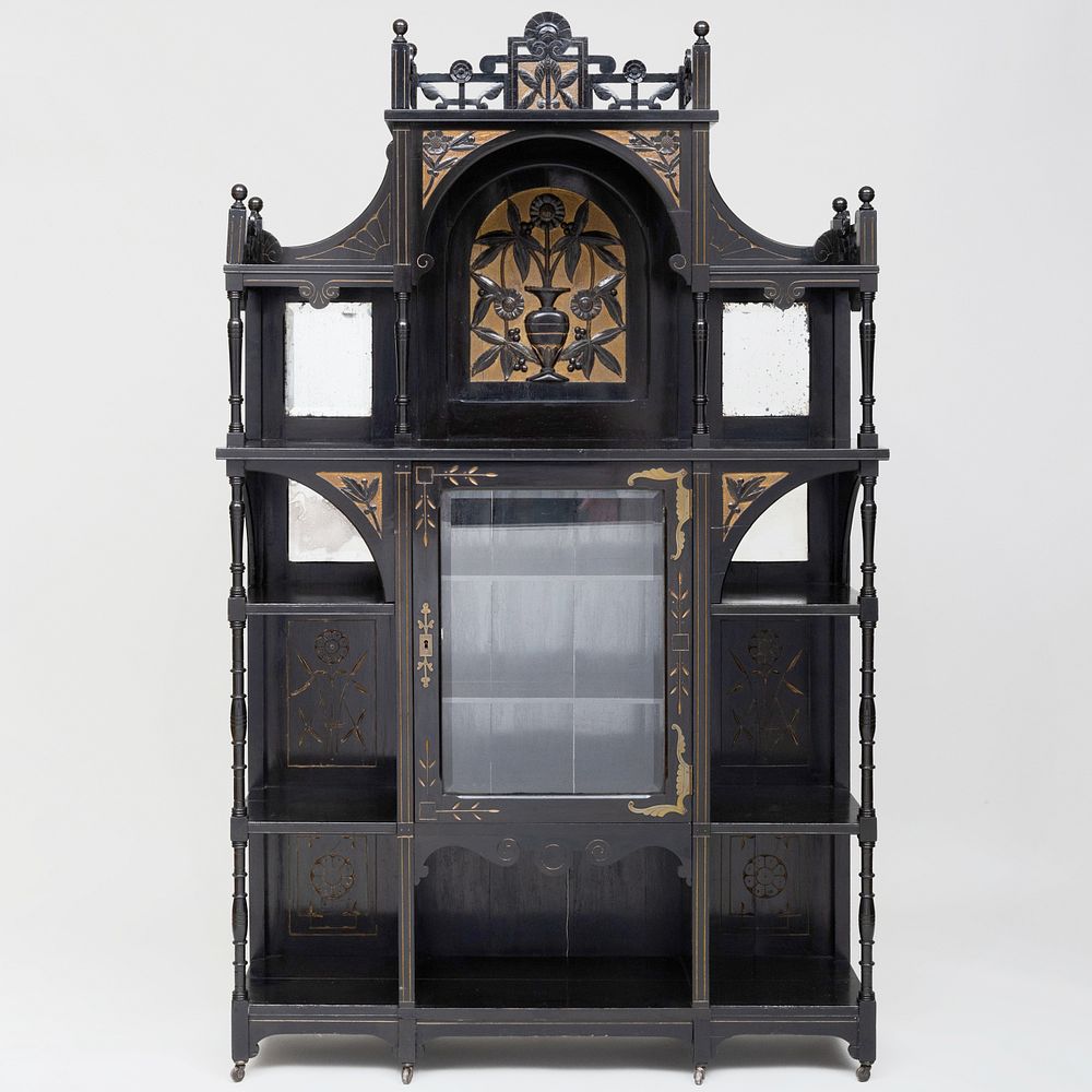 Appraisal: American Aesthetic Movement Ebonized Parcel-Gilt Cabinet Fitted with shelves and