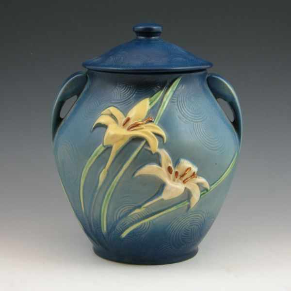 Appraisal: Roseville Zephyr Lily lidded cookie jar in blue Marked Roseville