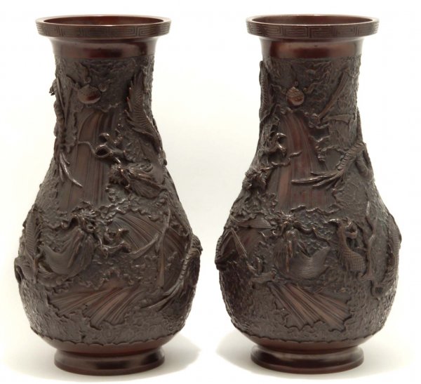 Appraisal: A pair of Chinese bronze vases Decorated with dragons in