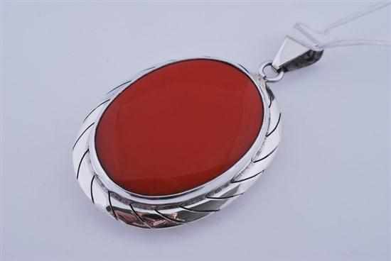 Appraisal: A RED STONE PENDANT IN STERLING SILVER