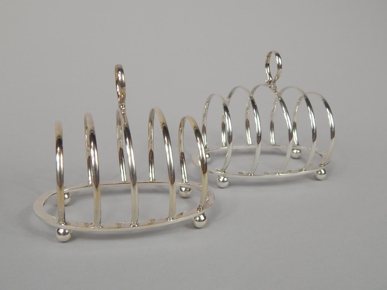 Appraisal: A pair of George V four division small toast racks