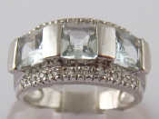 Appraisal: A French hallmarked carat white gold aquamarine and diamond ring