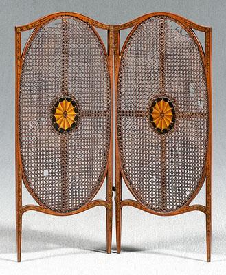 Appraisal: Painted two-panel cane screen Adam style decoration surrounding oval caned