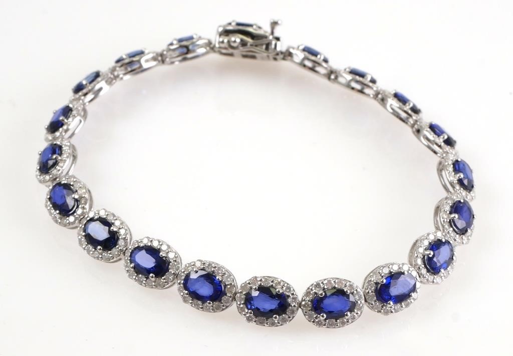 Appraisal: K white gold with oval mixed cut sapphires approx ct