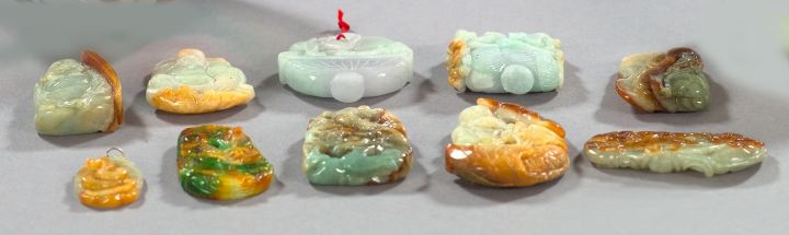 Appraisal: Collection of Ten Elaborately Carved Chinese Jade Pendants in the