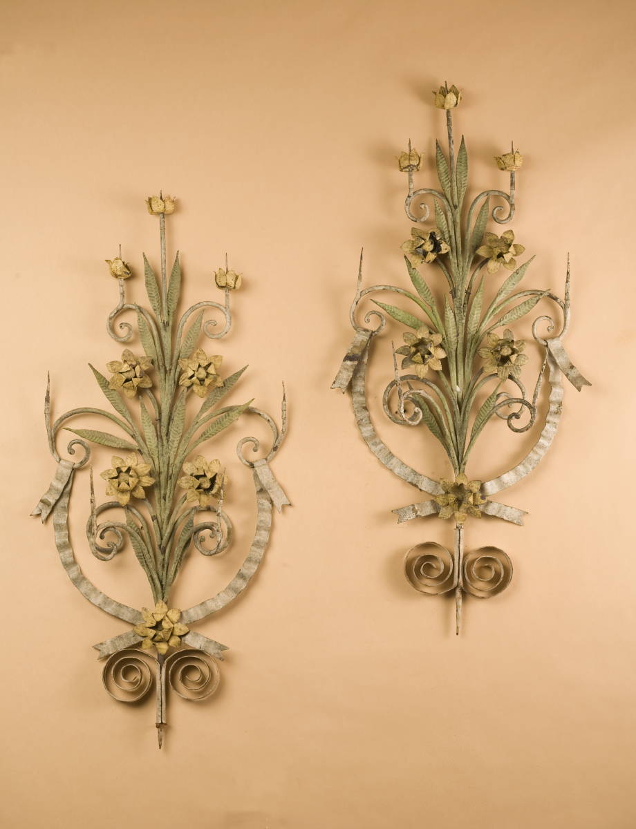 Appraisal: PAIR OF DECORATIVE YELLOW AND GREEN GLORAL PAINTED WALL APPLIQUES