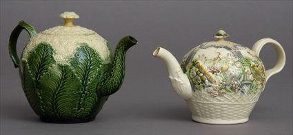 Appraisal: ENGLISH POTTERY CAULIFLOWER-FORM TEAPOT AND CREAMWARE TEAPOT The first realistically