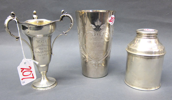 Appraisal: THREE PIECES SILVER HOLLOWWARE sterling trophy cup tri-handled with gilt