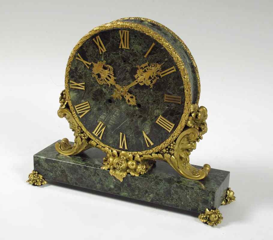 Appraisal: E F CALDWELL ORMOLU AND MARBLE MANTLE CLOCK Green variegated