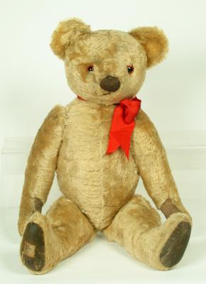 Appraisal: A Chad Valley teddy bear covered in pale gold plush