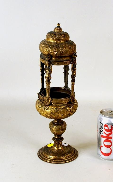 Appraisal: Early Continental Gilt Repousse Metal Oil Lamp Early Continental gilt