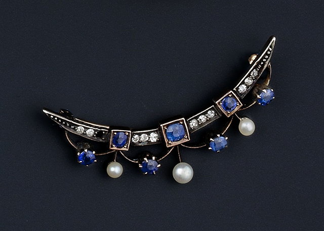 Appraisal: A LATE VICTORIAN SAPPHIRE DIAMOND AND HALF PEARL CRESCENT BROOCH