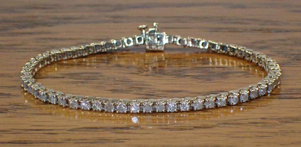 Appraisal: DIAMOND AND FOURTEEN KARAT GOLD TENNIS BRACELET The k gold