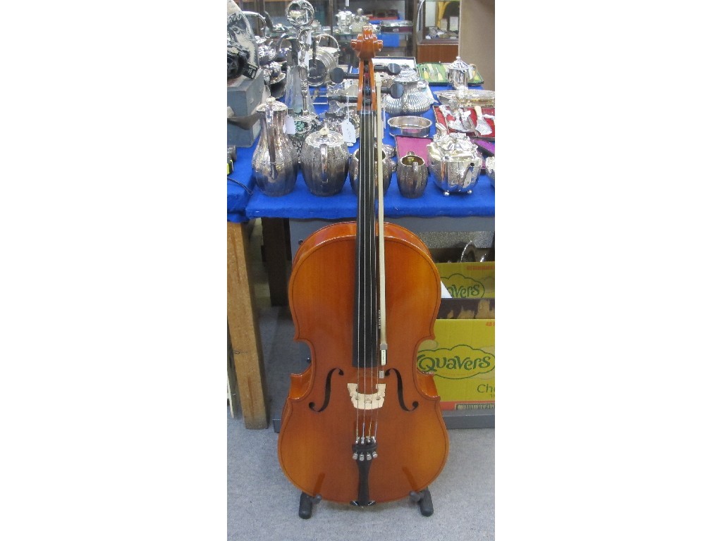 Appraisal: A small cello of German manufacture with a bow named