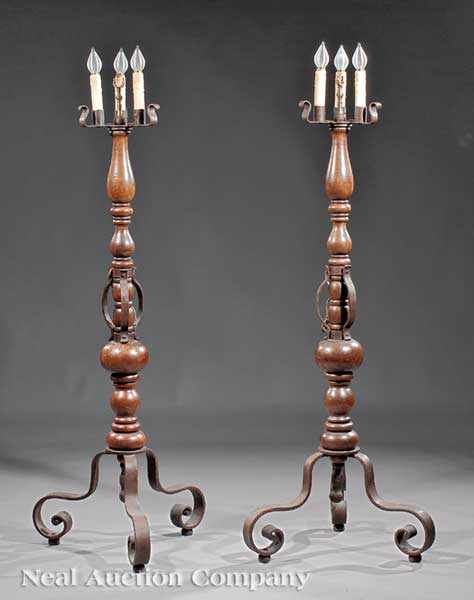 Appraisal: A Pair of Continental Wrought-Iron and Turned Walnut Torch res