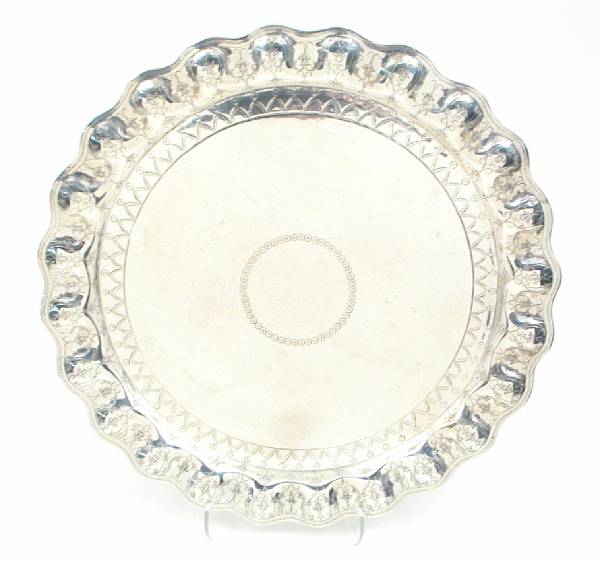 Appraisal: A Mexican sterling circular traySanborns Mexico City With chased decoration