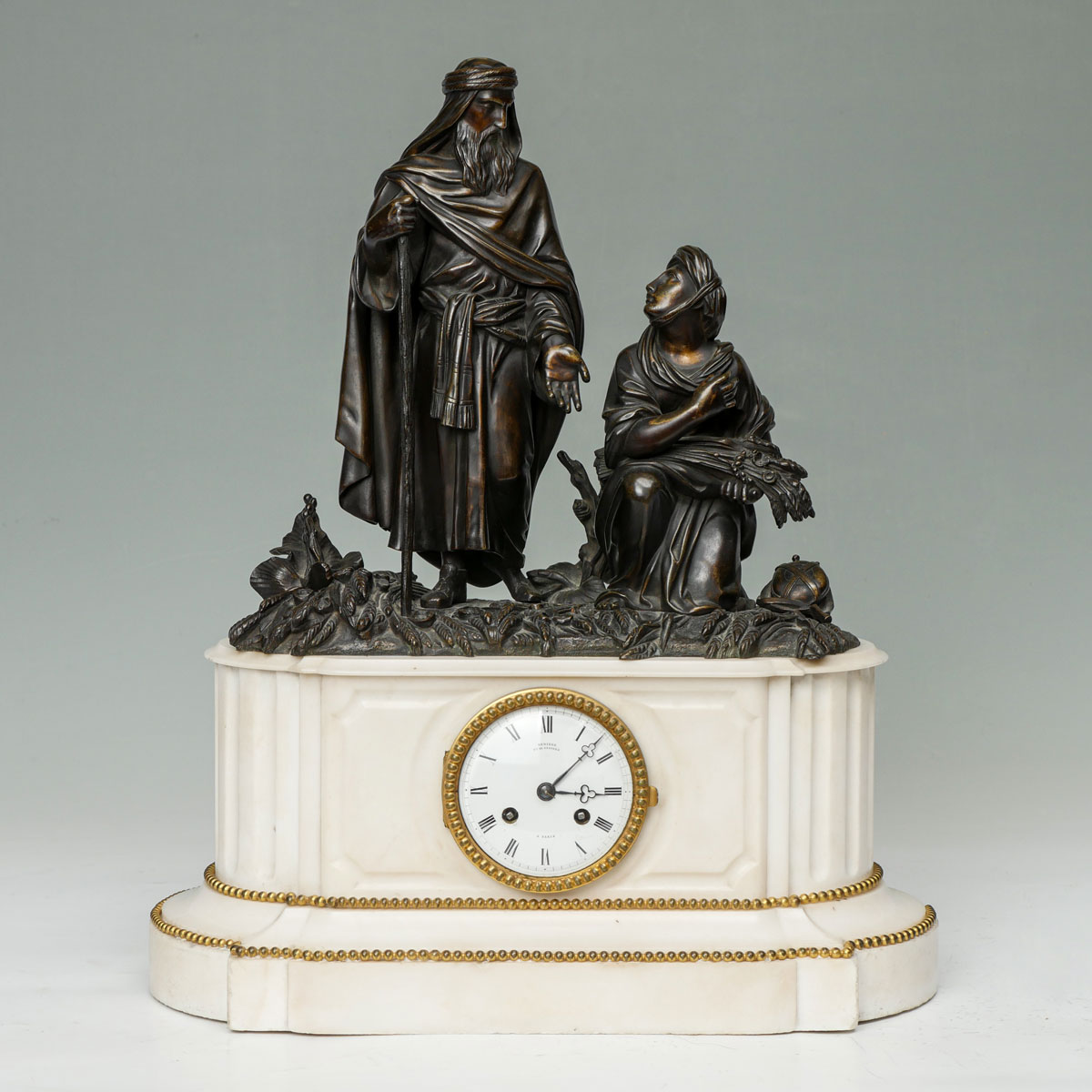 Appraisal: FRENCH FIGURAL BRONZE MARBLE MANTLE CLOCK French bronze white marble