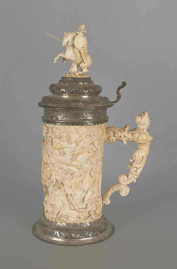 Appraisal: German carved ivory stein with silver mounts th th c