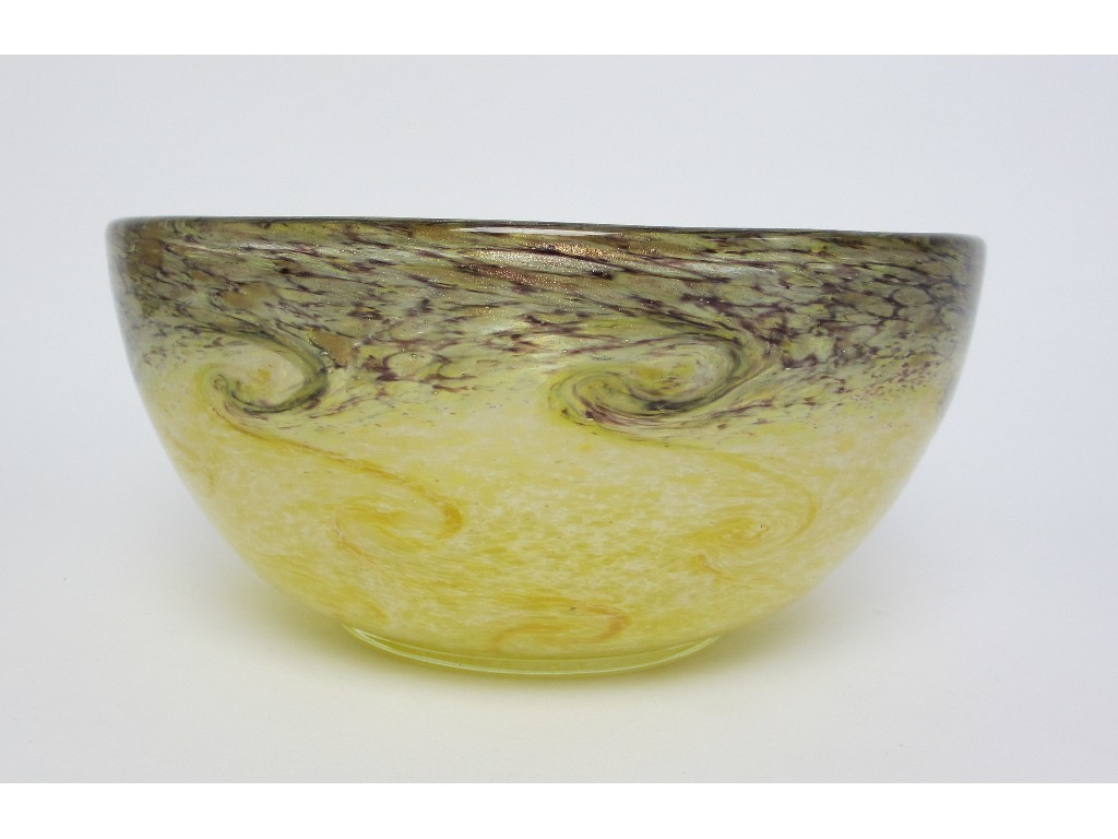 Appraisal: A Monart glass bowl decorated with swirling green brown and