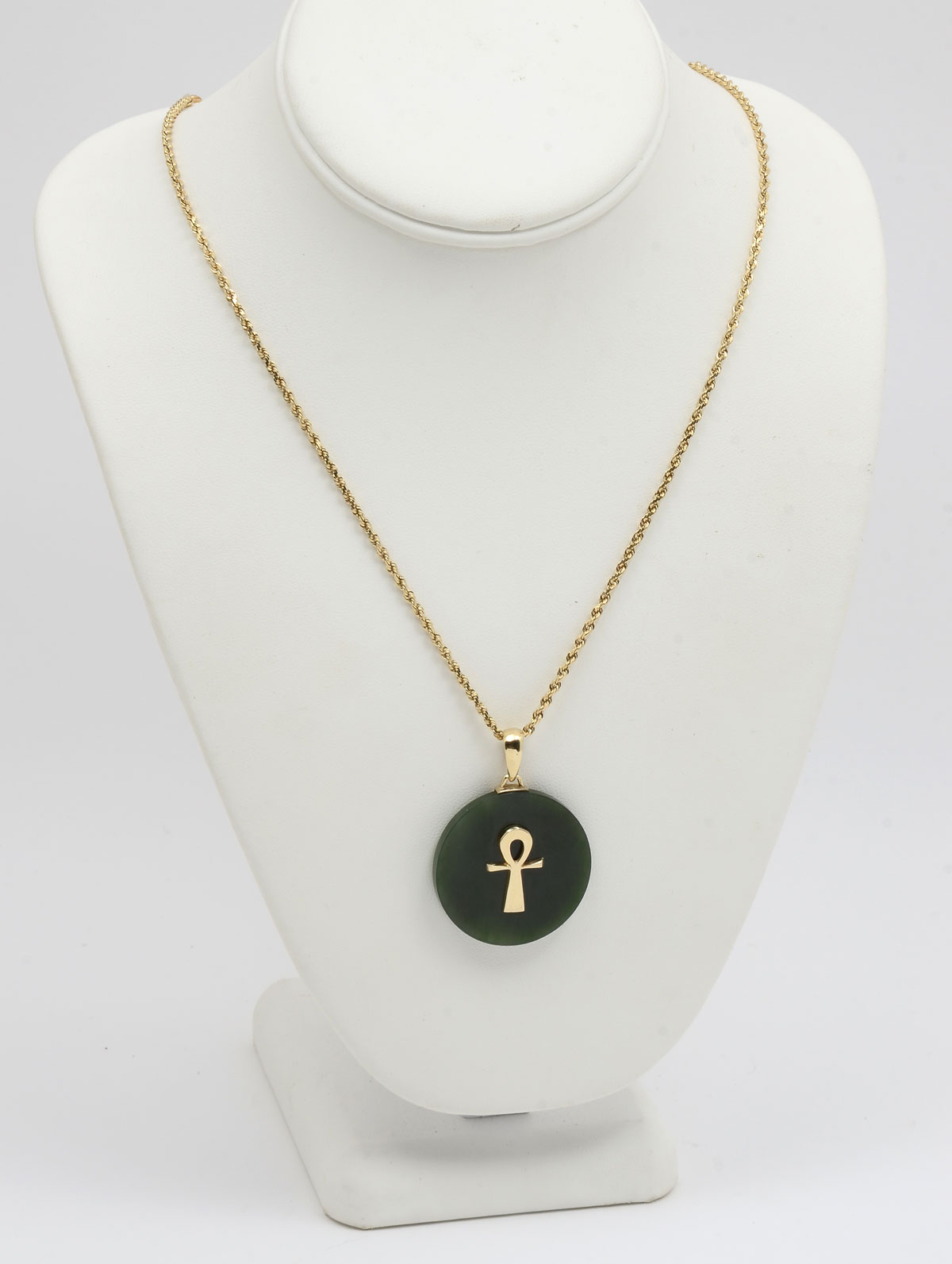 Appraisal: JADE PENDANT ON K SOLID ROPE CHAIN '' Jade disc