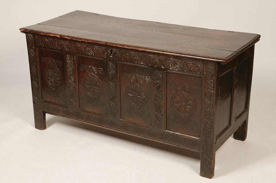 Appraisal: A GEORGE II OAK COFFER the rectangular top with a